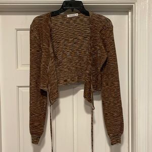 Cropped cross sweater